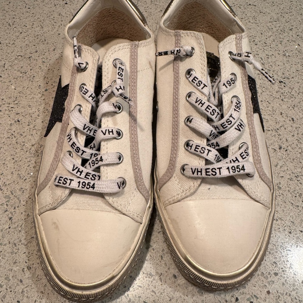 White Sneakers with Black Star Detail
